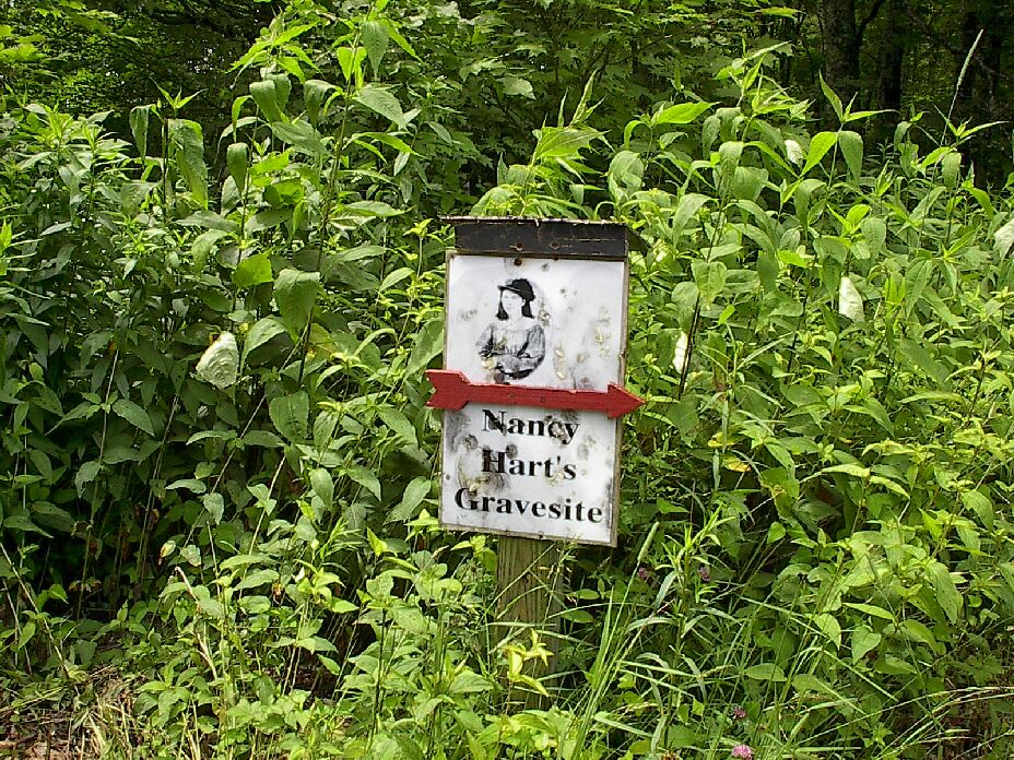 Sign marker with arrow pointing toward Manning Knob Cemetery also known as Nancy Hart Cemetery